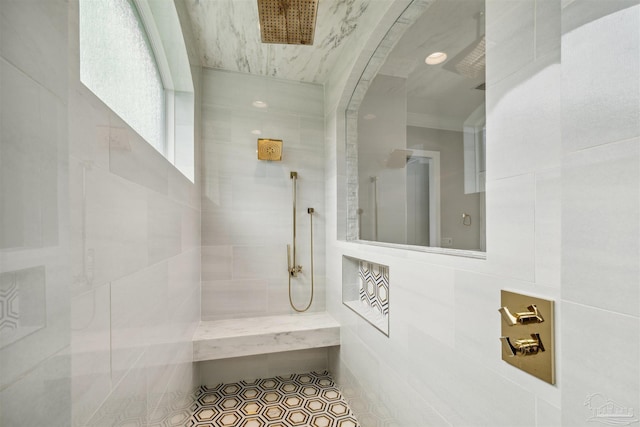 6126 E Fence Rd, Pensacola, FL 32526 - full bath with tiled shower, tile walls, and tile patterned floors