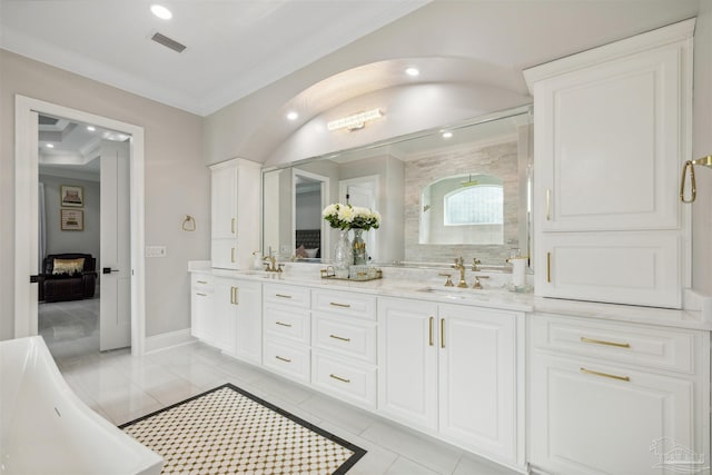 6126 E Fence Rd, Pensacola, FL 32526 - full bath featuring ornamental molding, double vanity, a freestanding tub, tile patterned flooring, and recessed lighting