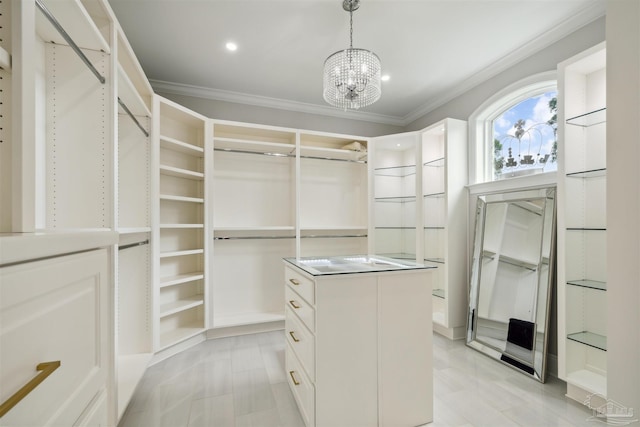 6126 E Fence Rd, Pensacola, FL 32526 - walk in closet featuring a chandelier