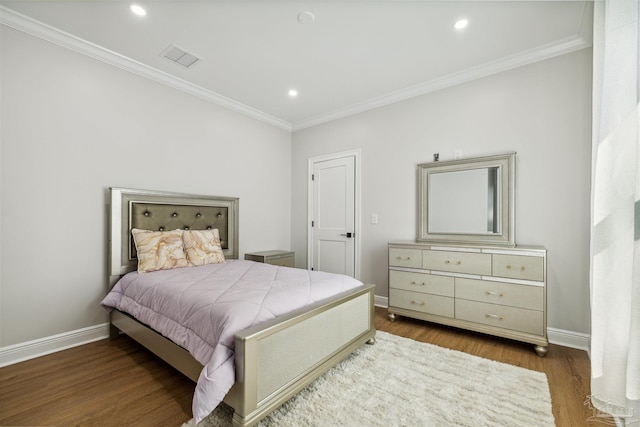 6126 E Fence Rd, Pensacola, FL 32526 - bedroom with wood finished floors, crown molding, and recessed lighting