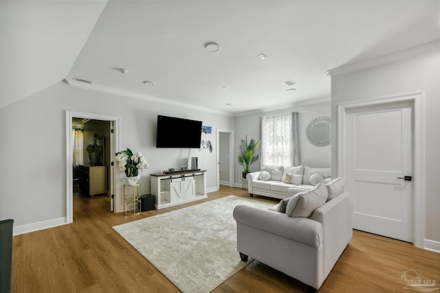6126 E Fence Rd, Pensacola, FL 32526 - living area featuring crown molding and light wood finished floors
