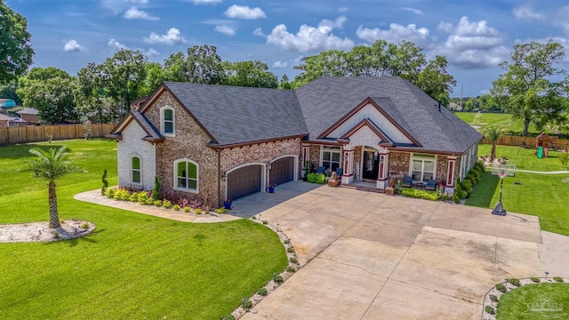 6126 E Fence Rd, Pensacola, FL 32526 - view of front of property with an attached garage, concrete driveway, a shingled roof, and brick siding