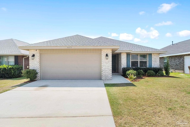 ranch-style house with a garage and a front lawn