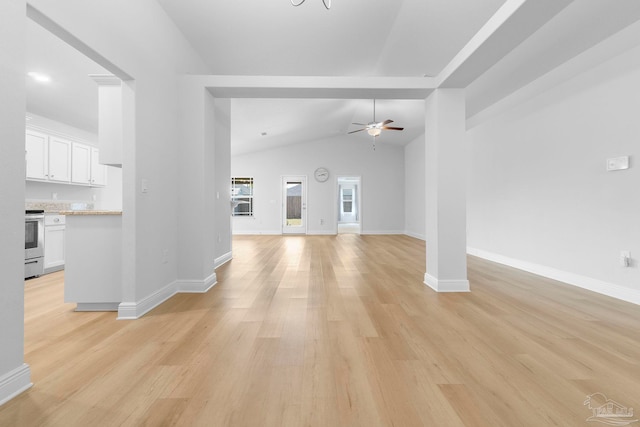 unfurnished living room featuring light hardwood / wood-style flooring, ceiling fan, and vaulted ceiling