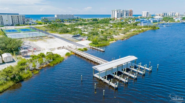 birds eye view of property featuring a water view