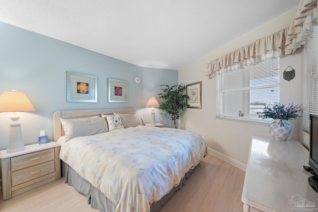 13753 Perdido Key Dr Unit 504, Perdido Key, FL 32507 - bedroom with light wood-type flooring and baseboards