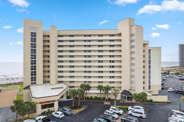 13753 Perdido Key Dr Unit 504, Perdido Key, FL 32507 - view of apartment building / complex with a water view and uncovered parking