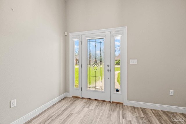 entrance foyer with light hardwood / wood-style floors