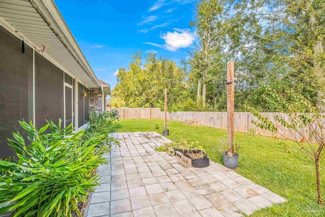 view of patio with a fenced backyard