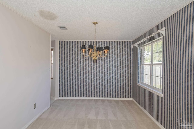 4416 Bellwood Cir, Pace, FL 32571 - unfurnished dining area featuring a textured ceiling, visible vents, a chandelier, carpet floors, and ornamental molding