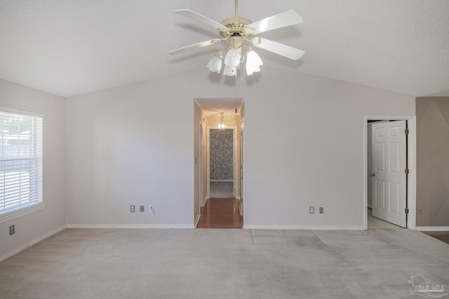 4416 Bellwood Cir, Pace, FL 32571 - unfurnished bedroom featuring lofted ceiling, carpet flooring, baseboards, and a ceiling fan