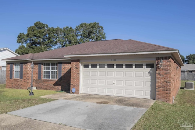 4416 Bellwood Cir, Pace, FL 32571 - single story home featuring central AC unit, concrete driveway, a front lawn, an attached garage, and brick siding