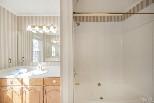 4416 Bellwood Cir, Pace, FL 32571 - full bath featuring wallpapered walls, shower / bathtub combination, vanity, and ornamental molding