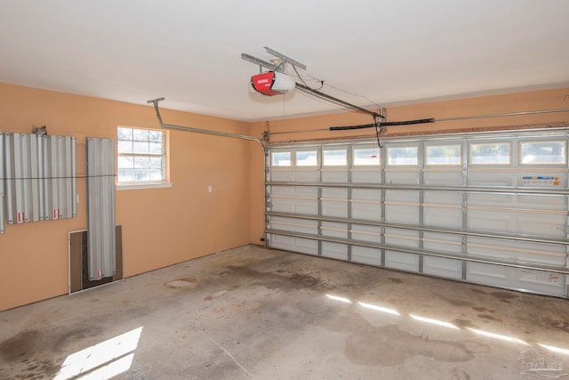 garage featuring a garage door opener