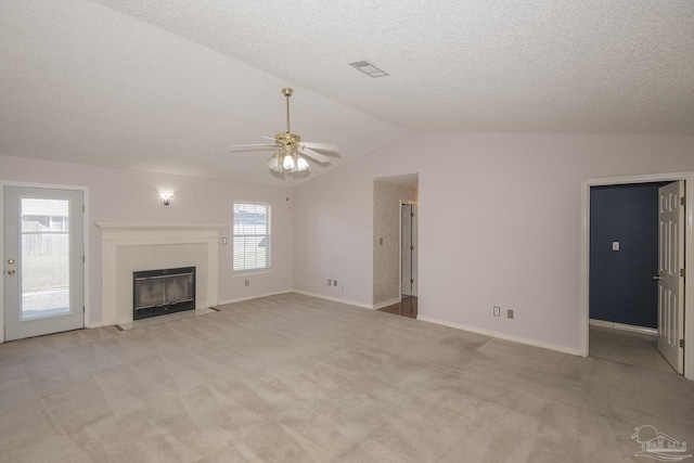 4416 Bellwood Cir, Pace, FL 32571 - unfurnished living room featuring a ceiling fan, light carpet, a fireplace, lofted ceiling, and visible vents