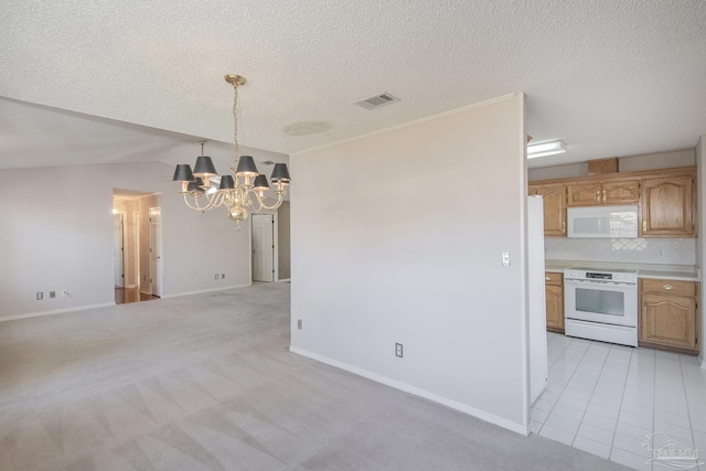 4416 Bellwood Cir, Pace, FL 32571 - kitchen featuring light countertops, visible vents, white appliances, tasteful backsplash, and a notable chandelier
