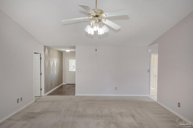 4416 Bellwood Cir, Pace, FL 32571 - spare room with light carpet, a ceiling fan, and baseboards