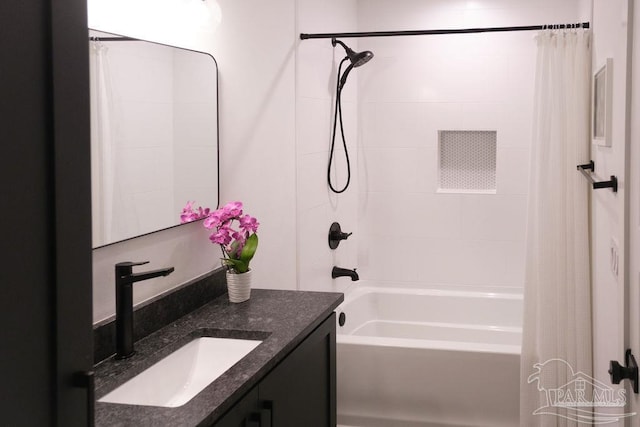 full bath featuring vanity and shower / tub combo with curtain