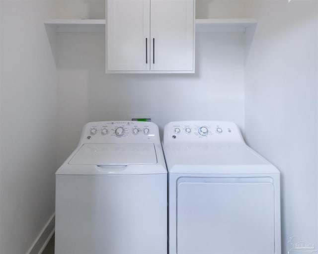 laundry area featuring cabinet space and independent washer and dryer