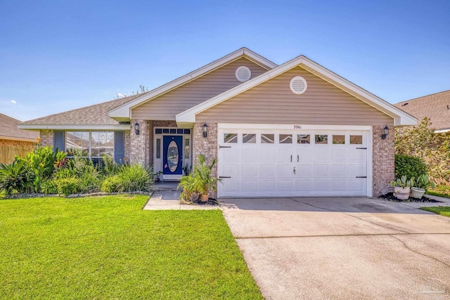 single story home featuring a garage and a front lawn