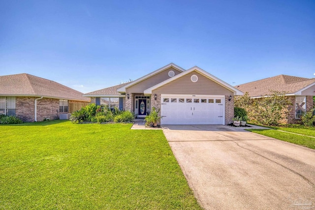 ranch-style house featuring a front yard and a garage