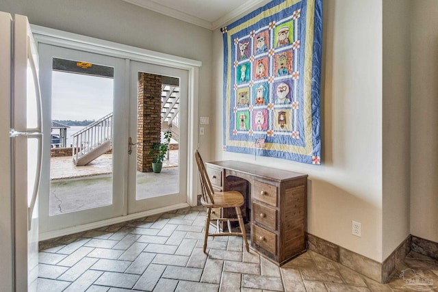 office space with ornamental molding, french doors, and baseboards