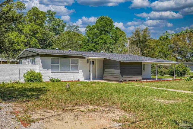 1029 Kearny Dr, Pensacola, FL 32505 - single story home featuring a front yard and brick siding
