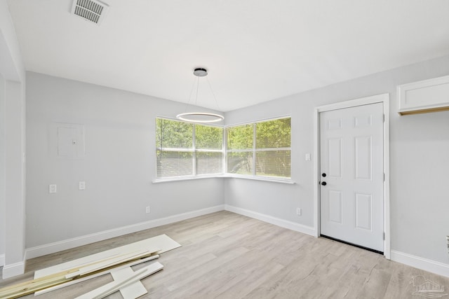 1029 Kearny Dr, Pensacola, FL 32505 - unfurnished dining area with baseboards, visible vents, and light wood finished floors