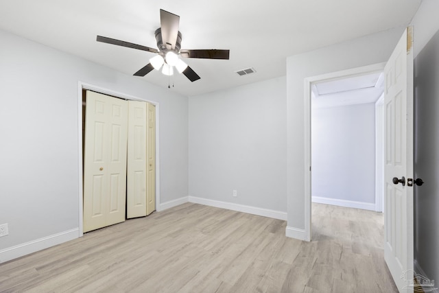 1029 Kearny Dr, Pensacola, FL 32505 - unfurnished bedroom with light wood-style floors, a closet, ceiling fan, baseboards, and visible vents