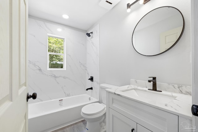 1029 Kearny Dr, Pensacola, FL 32505 - bathroom with toilet, shower / washtub combination, wood finished floors, and vanity