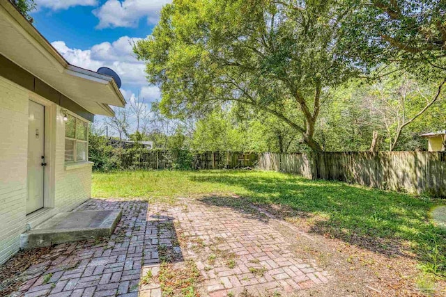1029 Kearny Dr, Pensacola, FL 32505 - view of yard featuring a fenced backyard and a patio area