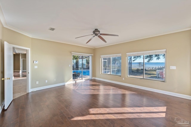 unfurnished room with ceiling fan, crown molding, and dark hardwood / wood-style floors