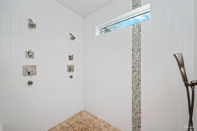 bathroom featuring tiled shower