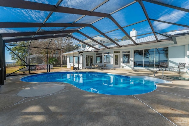 view of pool featuring a lanai and a patio area