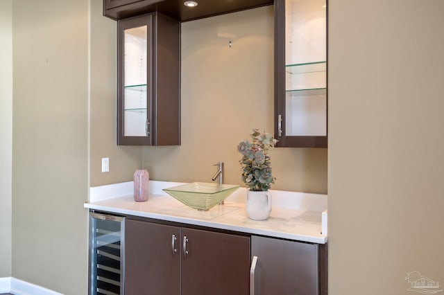 bathroom featuring vanity and wine cooler