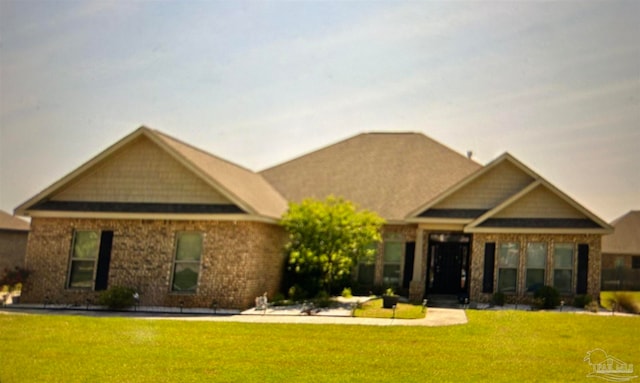 view of front of home with a front lawn