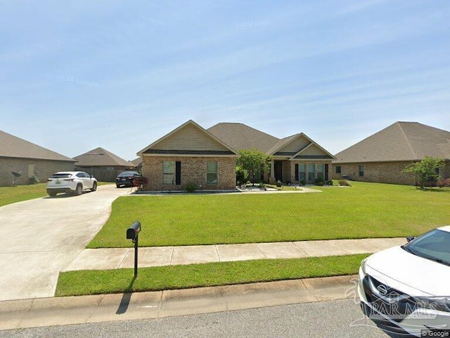 ranch-style home featuring a front yard