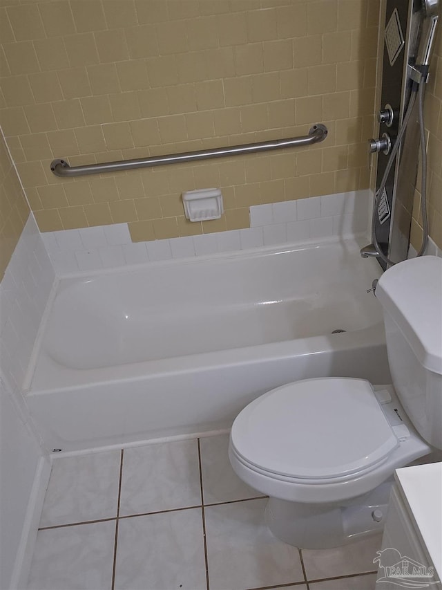 bathroom with tile patterned floors, vanity, and toilet