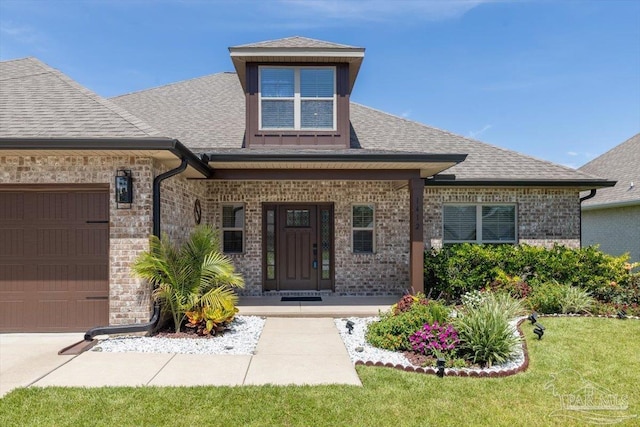 1412 Areca Palm Dr, Gulf Breeze, FL 32563 - entrance to property featuring a shingled roof, a garage, a porch, and brick siding