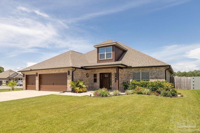 1412 Areca Palm Dr, Gulf Breeze, FL 32563 - view of front facade with brick siding, driveway, a garage, and a shingled roof