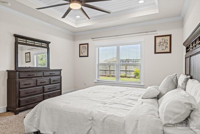 1412 Areca Palm Dr, Gulf Breeze, FL 32563 - bedroom featuring a tray ceiling, ornamental molding, ceiling fan, light carpet, and recessed lighting