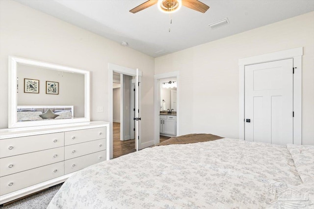 1412 Areca Palm Dr, Gulf Breeze, FL 32563 - bedroom featuring ensuite bathroom and ceiling fan