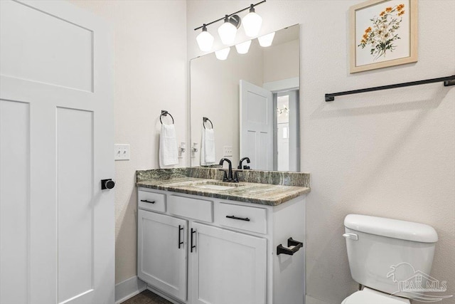1412 Areca Palm Dr, Gulf Breeze, FL 32563 - bathroom with vanity and toilet