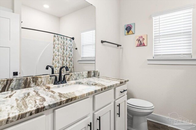 1412 Areca Palm Dr, Gulf Breeze, FL 32563 - bathroom featuring vanity, a shower with shower curtain, and recessed lighting