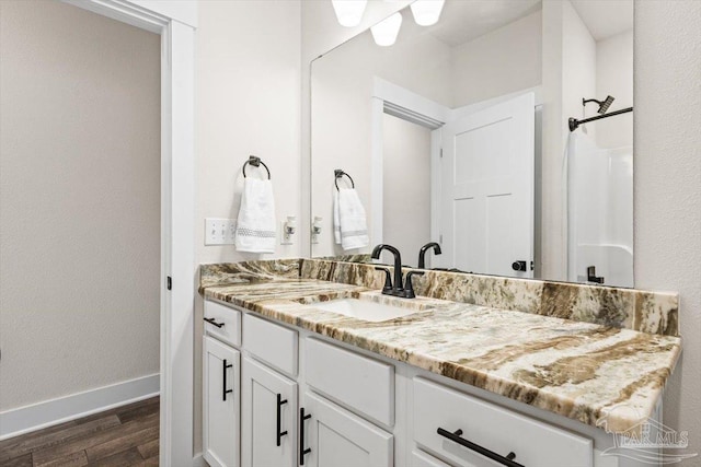 1412 Areca Palm Dr, Gulf Breeze, FL 32563 - bathroom with vanity and wood finished floors