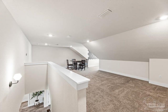 1412 Areca Palm Dr, Gulf Breeze, FL 32563 - hall with vaulted ceiling, an upstairs landing, carpet floors, and recessed lighting