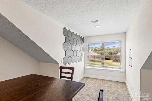 1412 Areca Palm Dr, Gulf Breeze, FL 32563 - unfurnished dining area with carpet and a textured ceiling