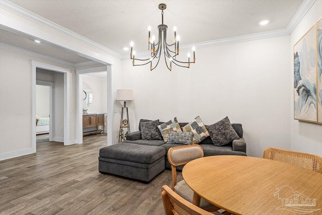 1412 Areca Palm Dr, Gulf Breeze, FL 32563 - dining room featuring a chandelier, wood finished floors, crown molding, and recessed lighting