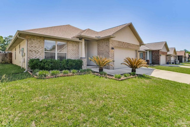 1024 Bretts Way, Cantonment, FL 32533 - ranch-style house with an attached garage, concrete driveway, a front lawn, and brick siding
