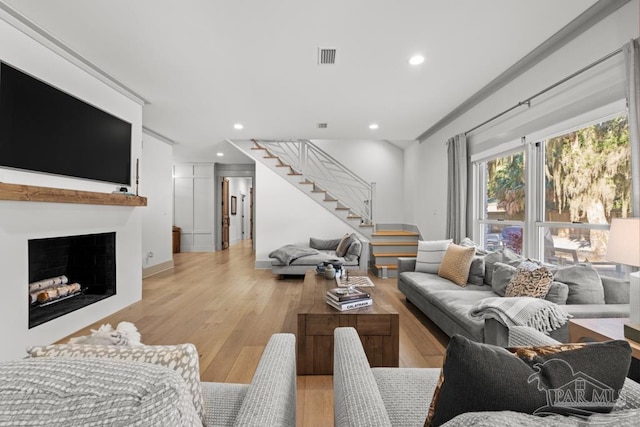 living room featuring light wood-type flooring